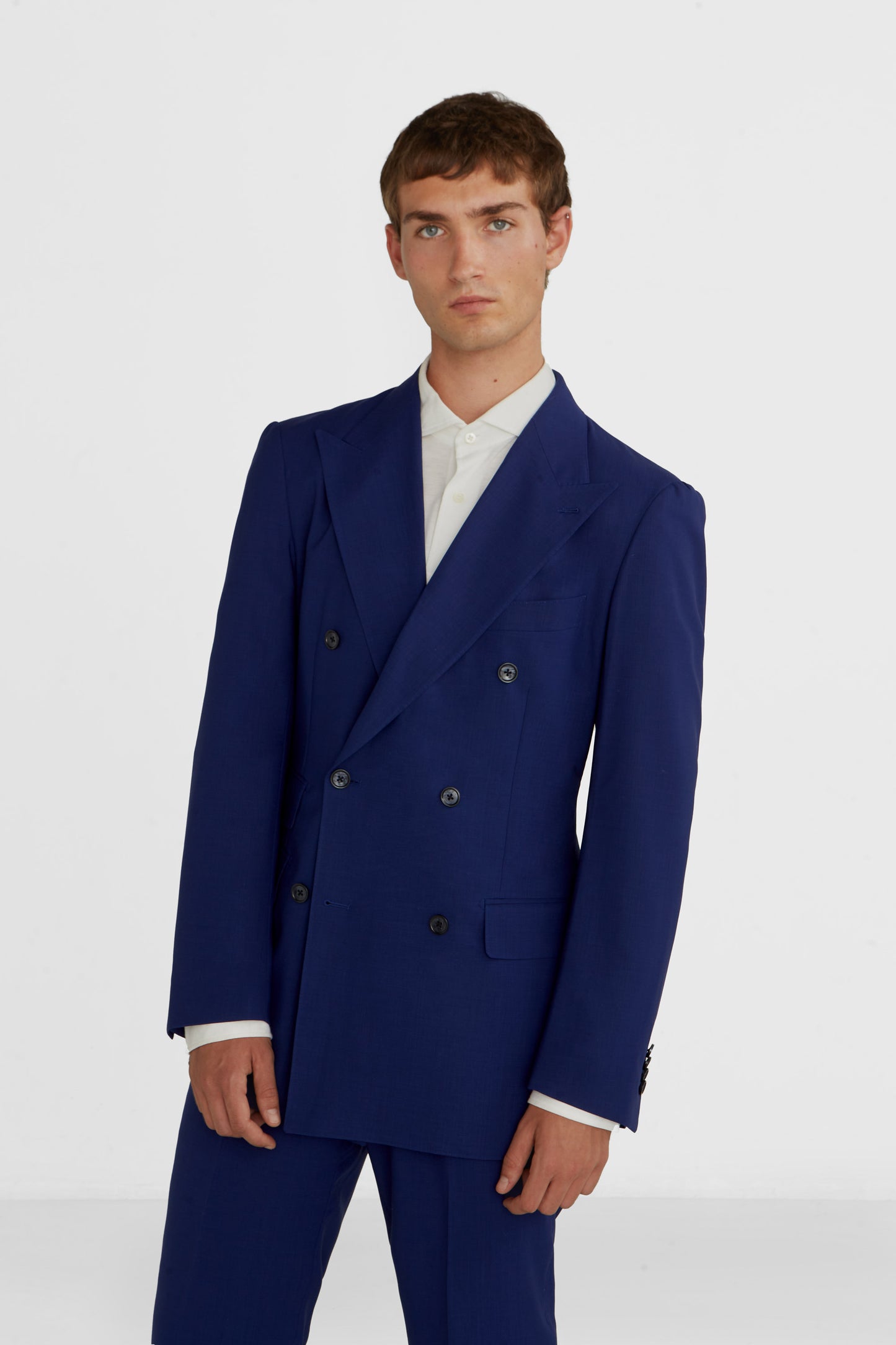 Decontructured light double - breasted suit super 120 wool
